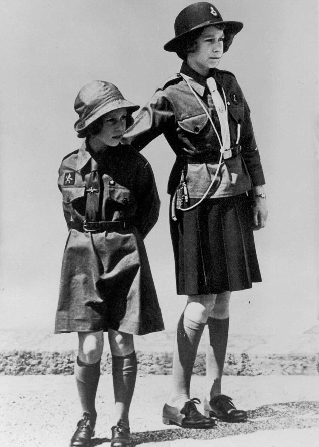 Photo of Queen of England Elizabeth and her sister Princess Margaret in Girl Scout uniforms