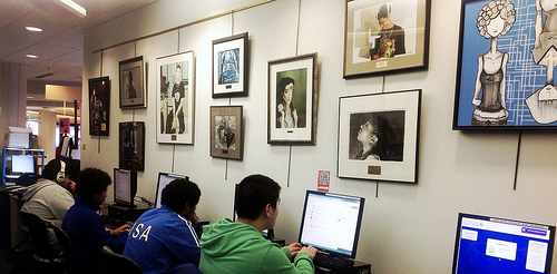 Teens using the computers under the teen art gallery at Central Library