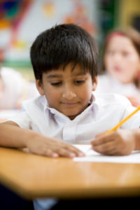 Boy taking a test in school