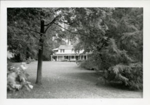 Bazil Hall home behind trees