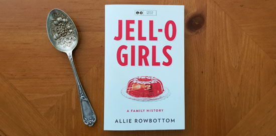 photo of a large silver spoon and a copy of Jell-O Girls