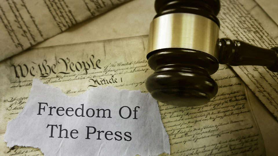 photo of a gavel and the words "Fredom of the Press"