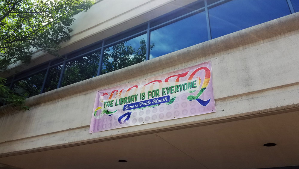Pride banner hanging at Central Library
