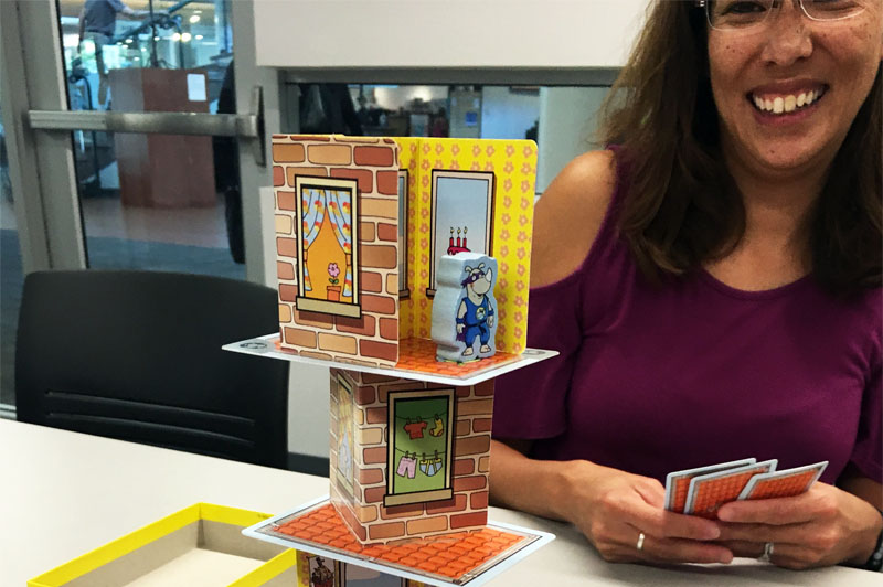 Mom with kids's tower game