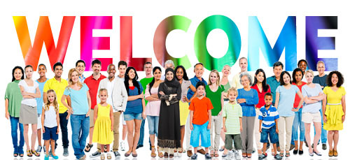 The words welcome in a rainbow colored font above an group of diverse human beings