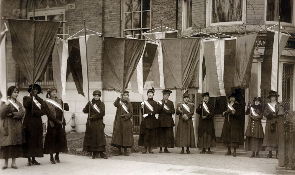 The first suffrage picket line leaving the National Woman's Party headquarters to march to the White House gates on January 10, 1917.