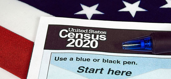 photo of a census form in front of American flag