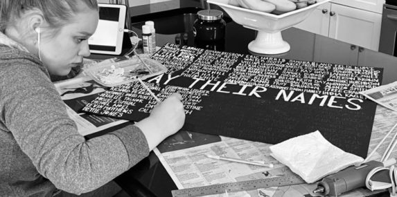 I snapped this picture of my daughter working on a protest sign; she worked for 6 hours etching their names. After a day of protesting on the streets of DC with her sister, she came home with heat exhaustion, dehydration, and blisters, but still carrying the sign. (Pictured: Julia Elman, Washington Liberty HS class of 2019, Princeton University class of 2023)