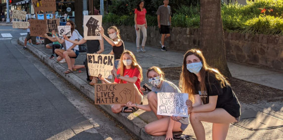 This photo was taken on Wilson Blvd on 6/8/20. It shows a group of children from the Lyon Village neighborhood who wanted to protest locally.