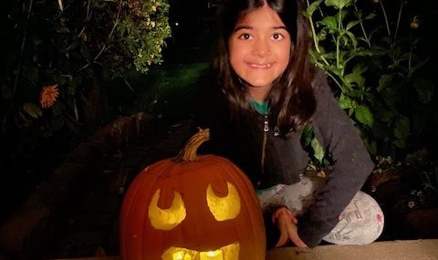 I am 8 3/4 years old and I carved this pumpkin all by myself. I choose the name 'give me a treat!' because, she is looking up and smiling so I thought it would fit. I hope you choose mine!