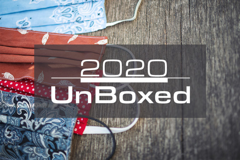 Photo of colored cloth face masks with a typographic logo of "2020 UnBoxed."