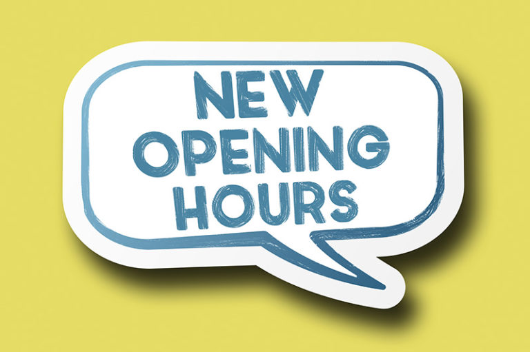 Yellow sign depicting New Operating Hours."