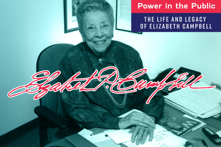 Photo of Elizabeth Campbell sitting at her desk with text logo of the exhibition "Power in the Public" and her signature. Photo credit: Chad Evans Wyatt