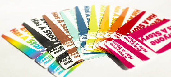 Colorful library cards with text reading "Everyone Has a Story"
