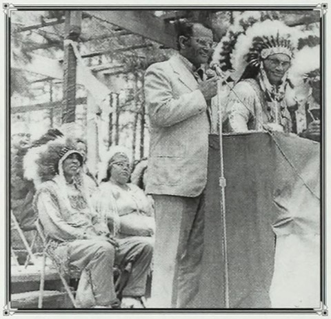 Oxendine with Chief W.R. Richardson speaking to a tribe.