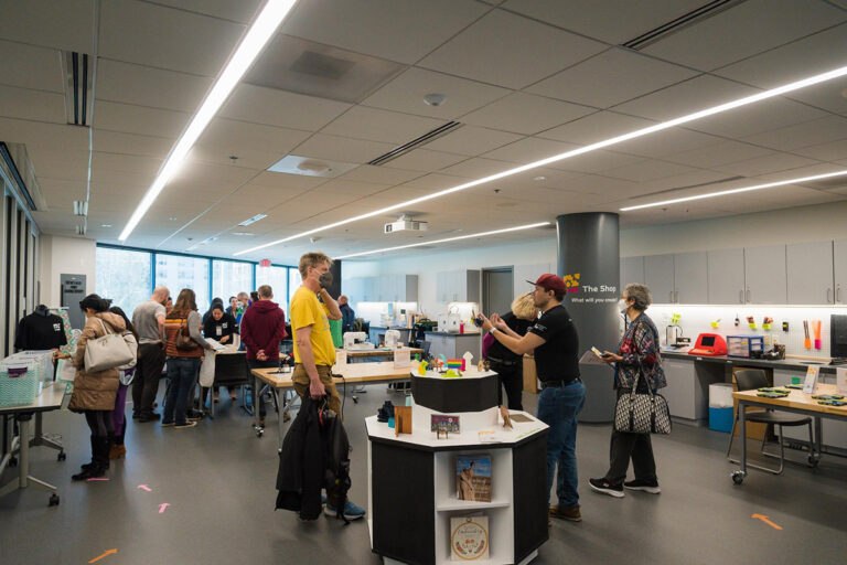 people gathering at the library's makerspace.