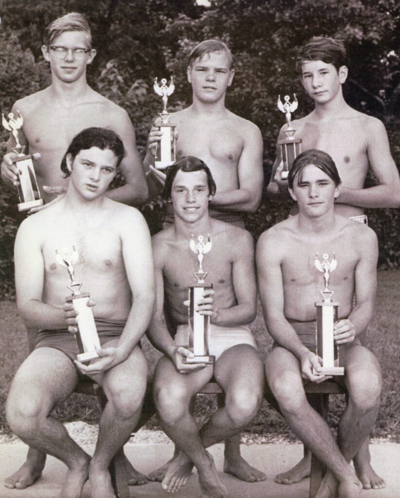 A photo of Stuart Paine, who was in the center with a trophy at the 1969 NVSL meet.