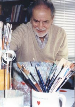 Rudy Wendelin with his paint brushes.