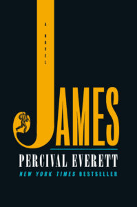 James by Percival Everett: A strikingly simple black cover with a bold, golden "J" dominating the space. The silhouette of a figure carrying a bag is incorporated into the curve of the "J." The author’s name and “A Novel” are in smaller text below.