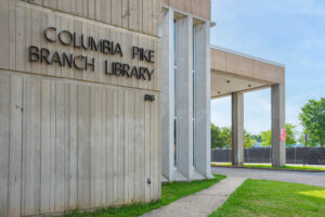 The outside of the Columbia Pike Branch Library building, with its name spelled in metal lettering on the exterior wall.