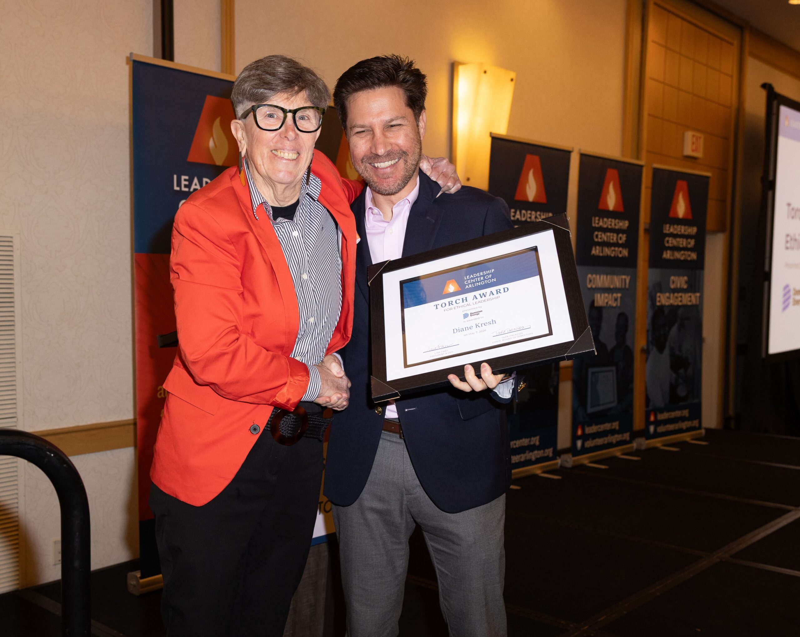 Diane Kresh receives 2026 Torch Award.