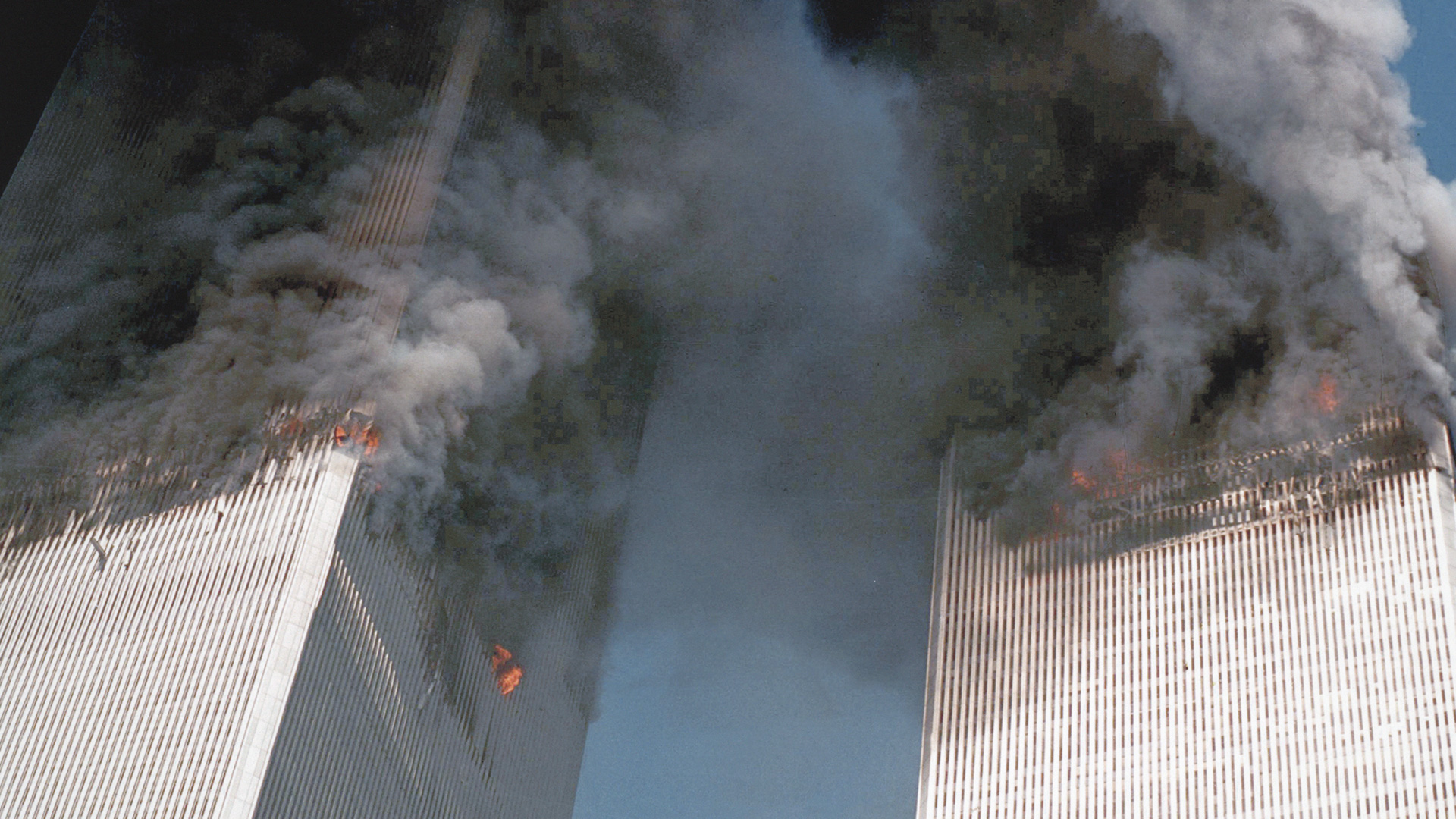 Twin Towers on Fire View of the twin towers on fire, following the September 11 terrorist attacks on the World Trade Center, New York City. Photo credit Juan González. Library of Congress, Prints & Photographs Division, LC-DIG-ppmsca-02099
