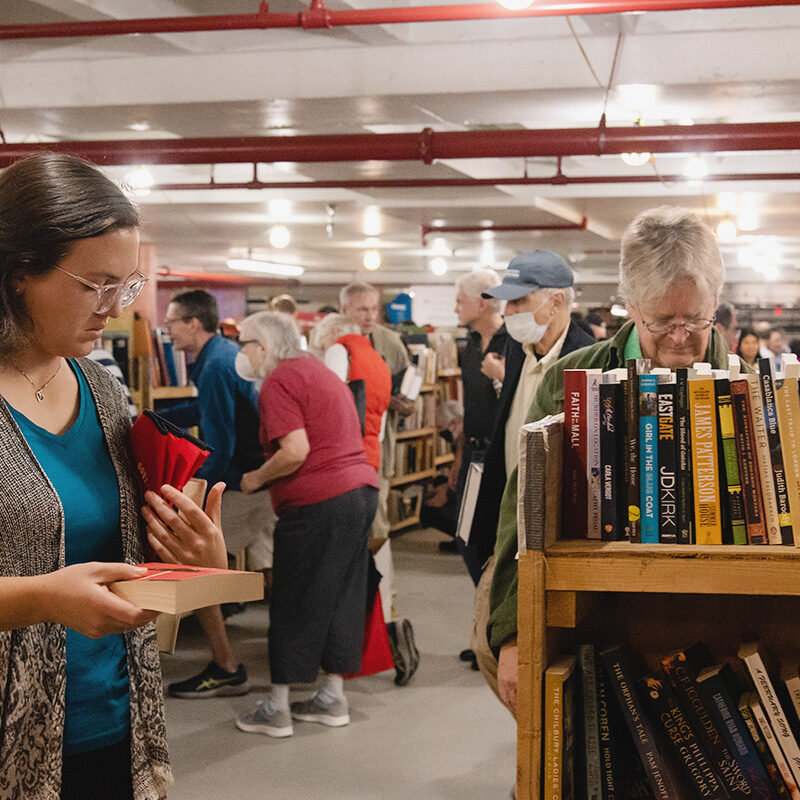 Patrons shopping the Friends of the Arlington Public Library book sale at the Central Library garage.