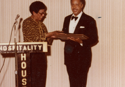 John Robinson receiving an award.