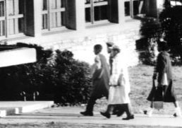black and white photograph of 4 black students entering Stratford Junior High in 1959