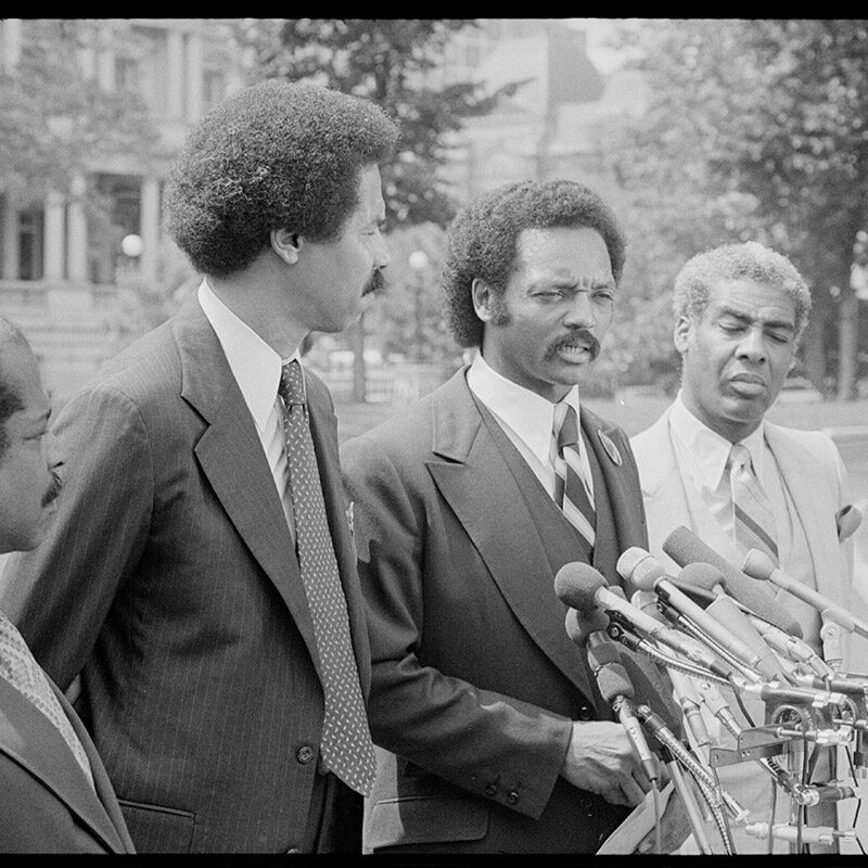Photo of Rev. Jesse Jackson (second from the right) speaking at a press conference, 1979, Library of Congress, Prints and Photographs Division, LC-U9-37985- 14, photograph by Marion S. Trikosko